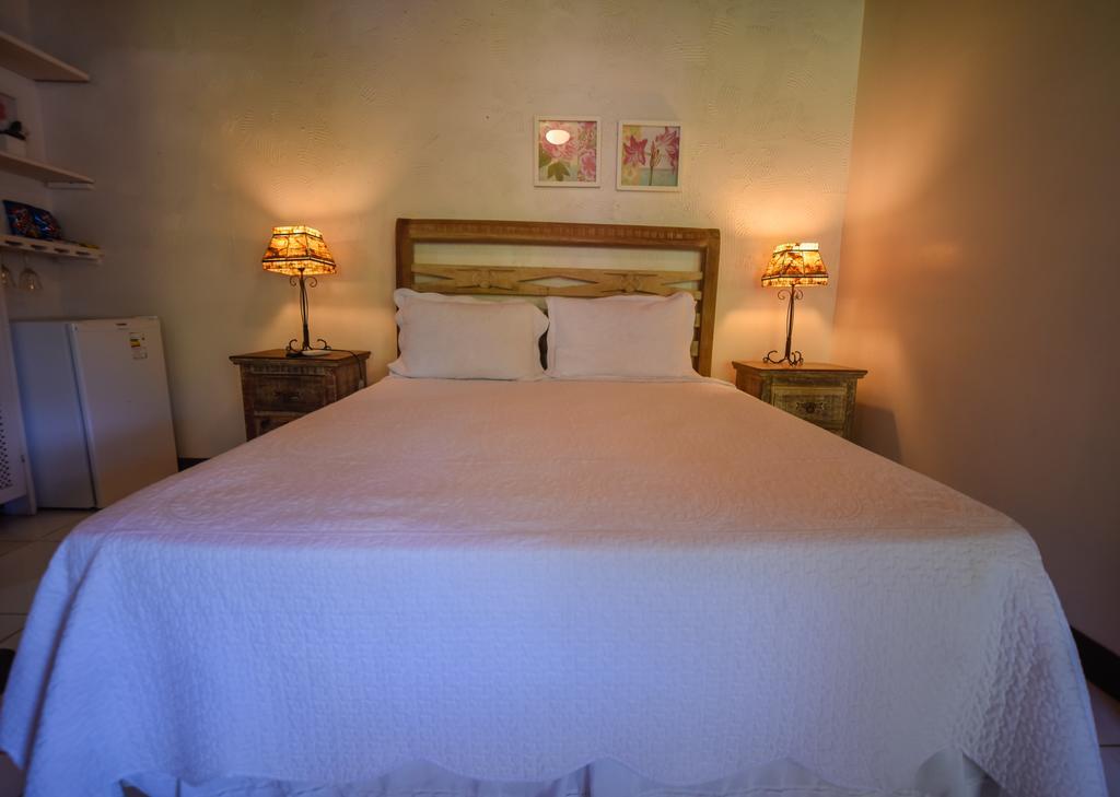 Quarto com Cama Queen-size e Vista do Mar